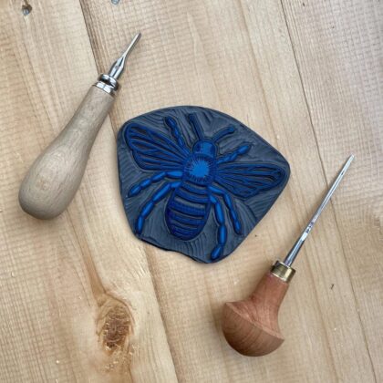 Bee carved lino block