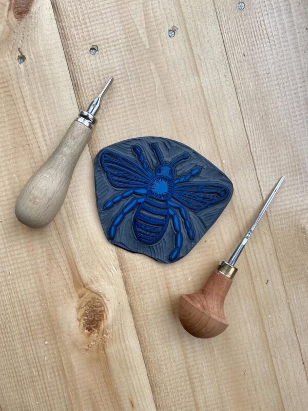 Bee carved lino block