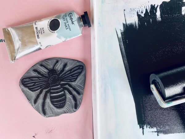 Bee inked lino block black