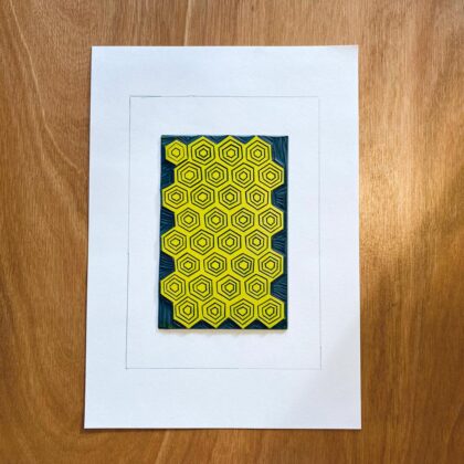 Bee print inked honeycomb lino block