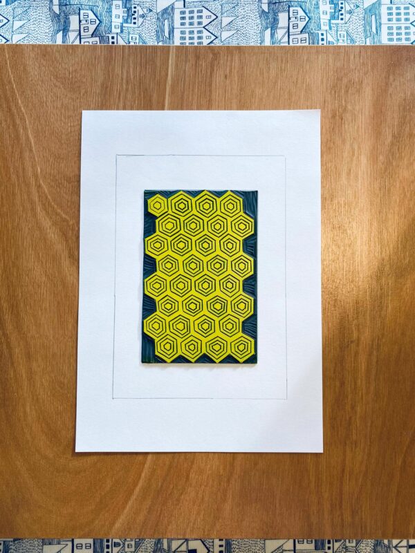 Bee print inked honeycomb lino block