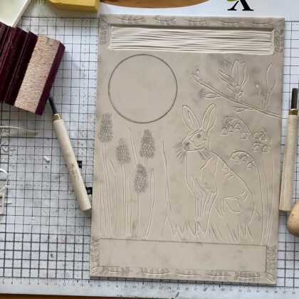 Carving progress hare in spring lino block