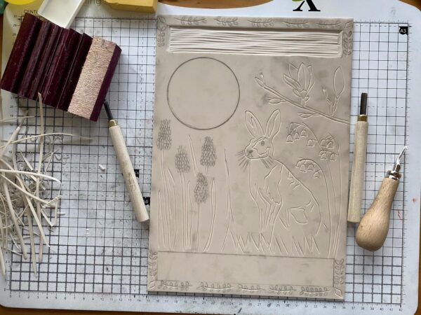 Carving progress hare in spring lino block