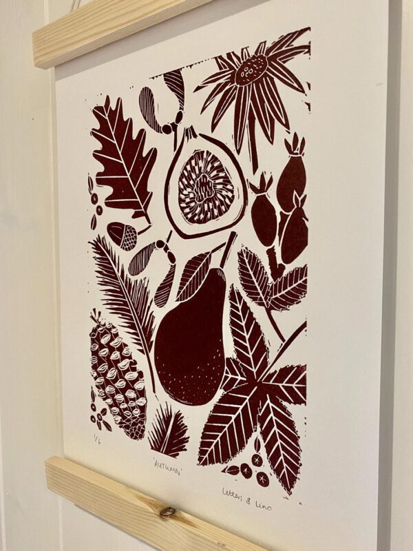 Close up autumn linocut print hanging