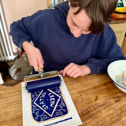 Family workshop custard cream rolling