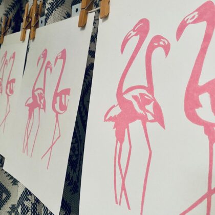 Flamingos reduction linocut first pink layer