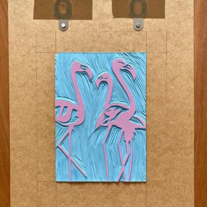 Flamingos reduction linocut print inked block