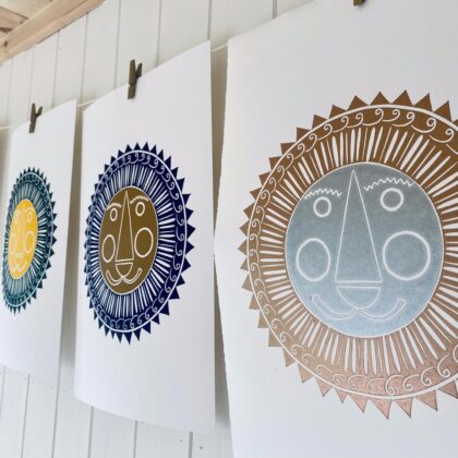 Mr lion lino cut prints hanging