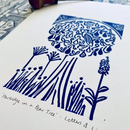 Partridge in a pear tree a4 blue linocut print close up