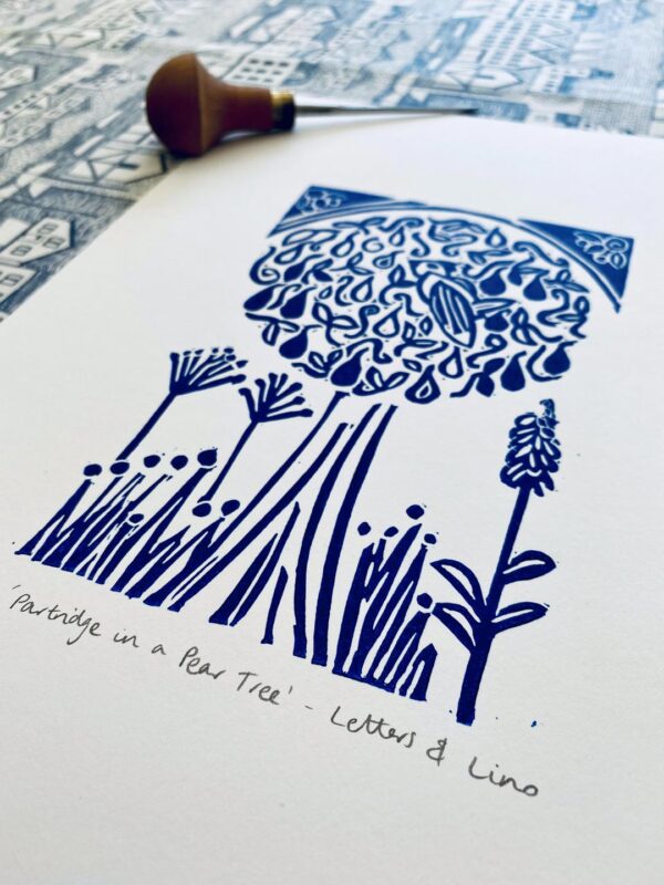 Partridge in a pear tree a4 blue linocut print close up
