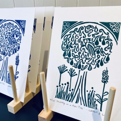 Partridge in a pear tree a5 blue green linocuts