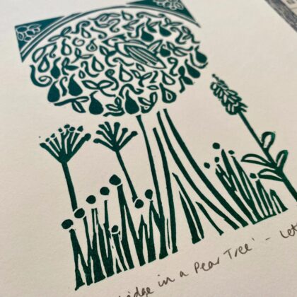 Partridge in a pear tree a5 green lino cut print close up