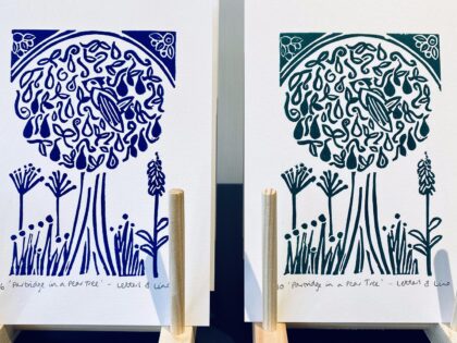 Partridge in a pear tree lino prints drying