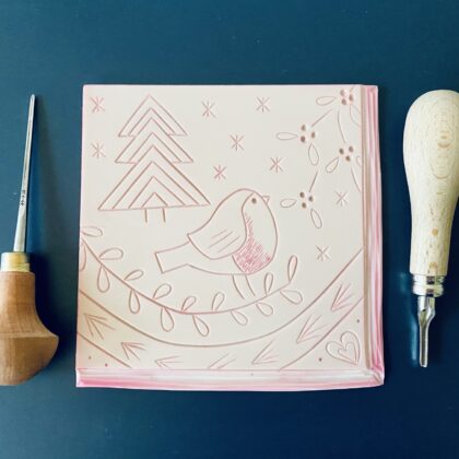 Robin christmas card lino block Robin christmas card lino block