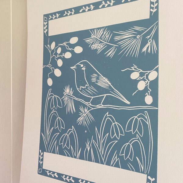 Robin in winter lino cut print detail
