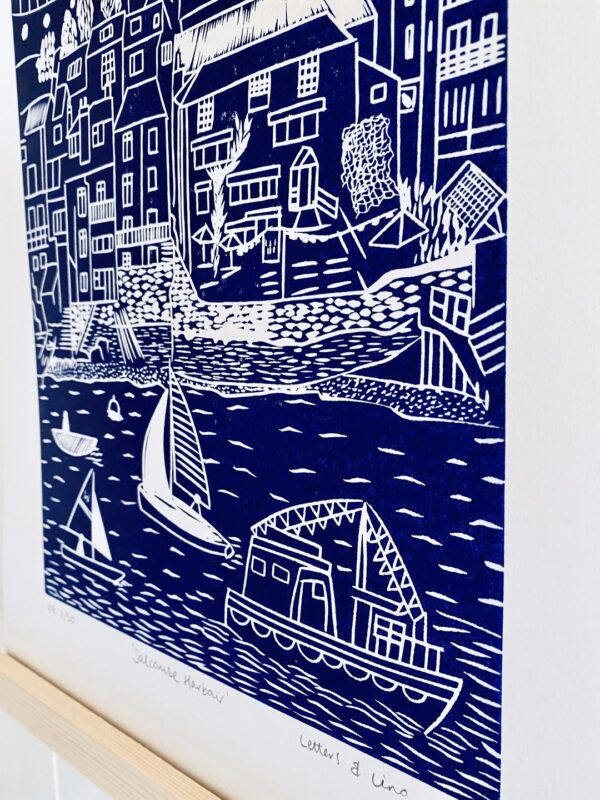 Salcombe navy linocut print close up hanging