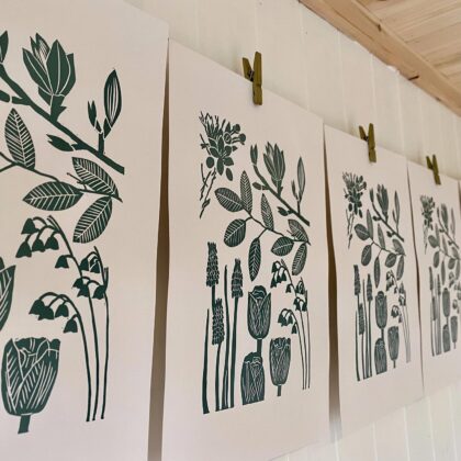Spring linocut prints hanging to dry