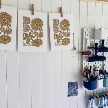 Summer linocut print hanging to dry